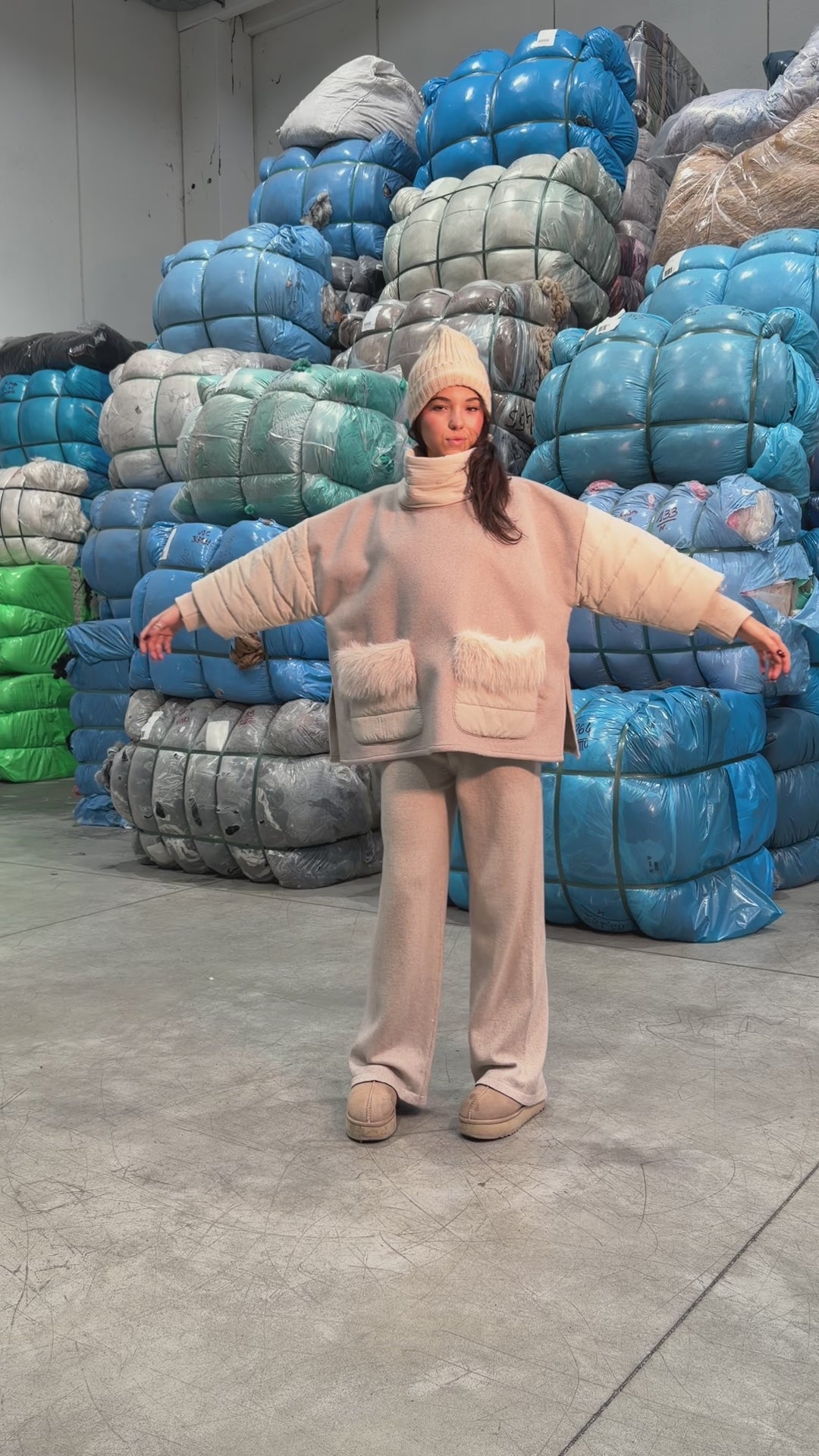 Mantella con maniche in piumino